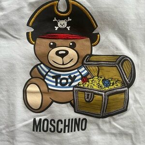 White kids Mochino Tshirt size 6.